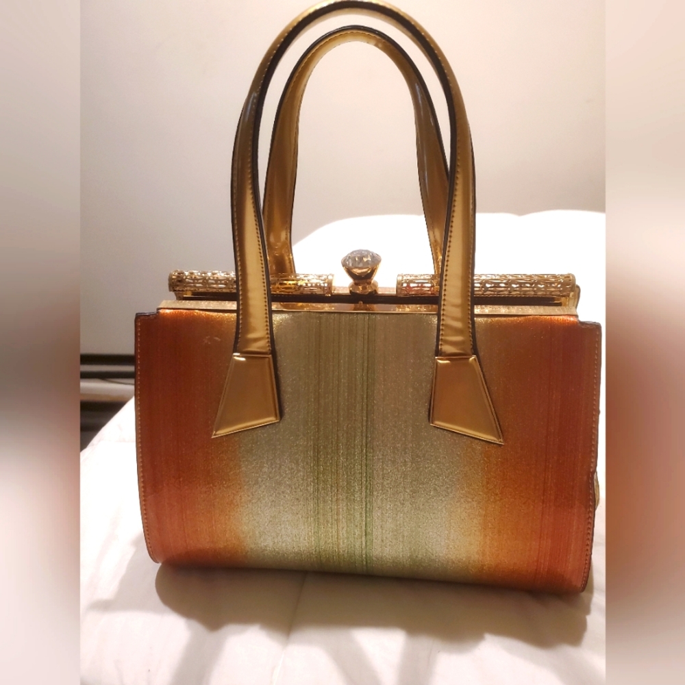 Bold metallic handbag. Gold and amber with a vintage feel.